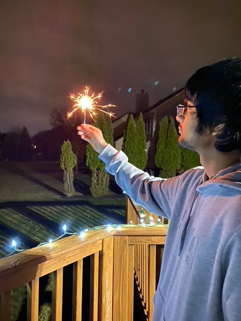 holding up a diwali sparkler!!